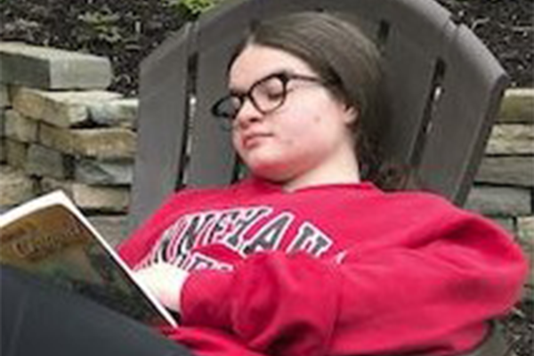 Little Girl Wearing Glasses Slept While Reading Book